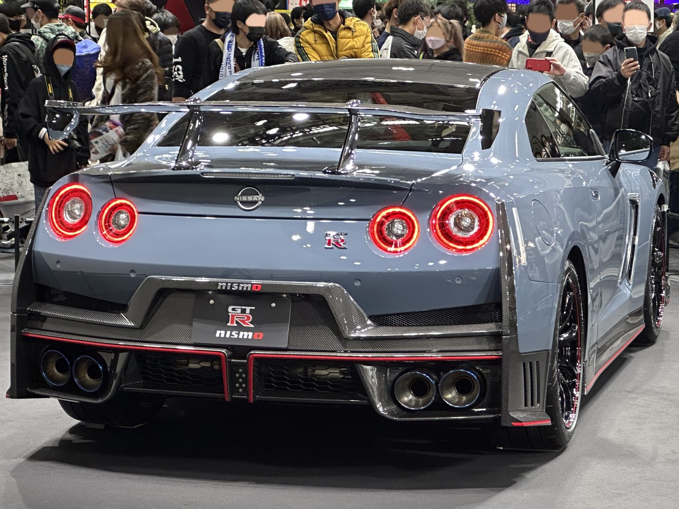 Round taillights, quad exhausts, large rear carbon fiber wing