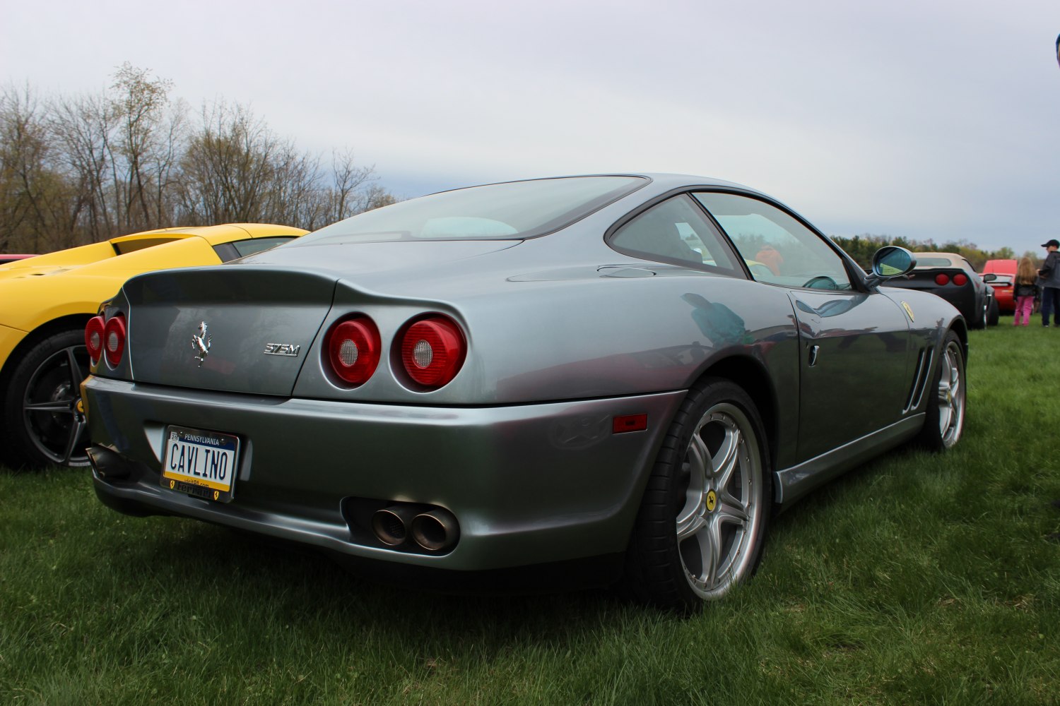 Rear view with dual round taillights and quad exhaust pipes