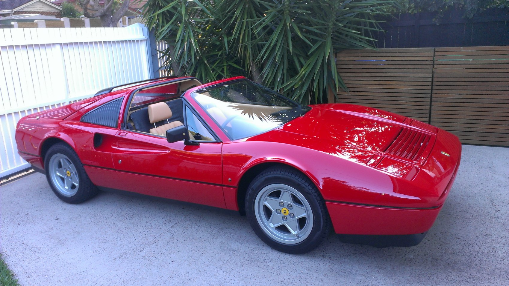 Classic sports car with targa roof and alloy wheels