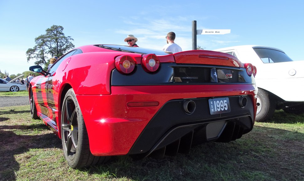 Rear view showing dual exhaust and round taillights