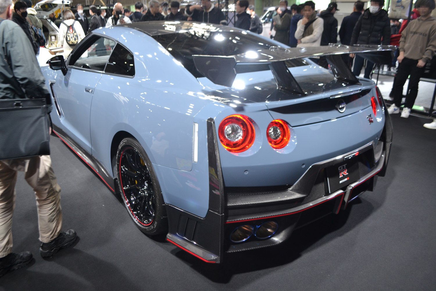 Rear view with carbon fiber wing and dual round taillights