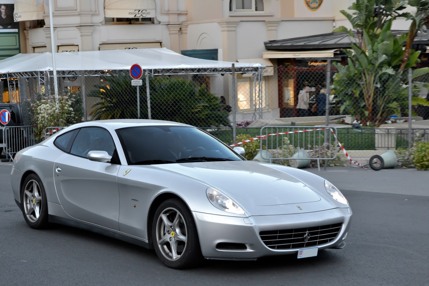 Silver sleek coupe with iconic front grille