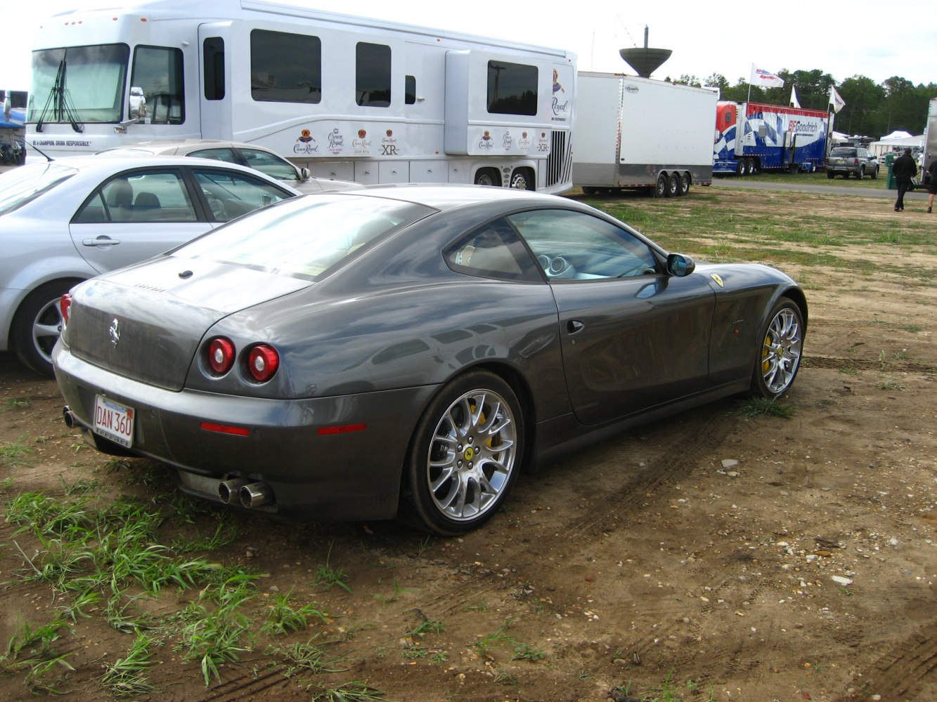 Rear and side view with dual round tail lights and alloy wheels
