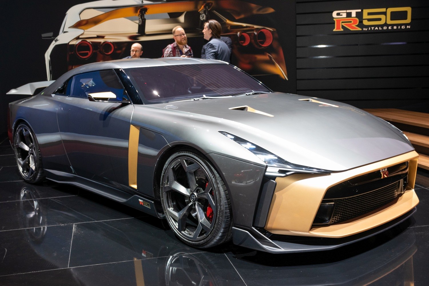 Angular headlights and aerodynamic body with large alloy rims