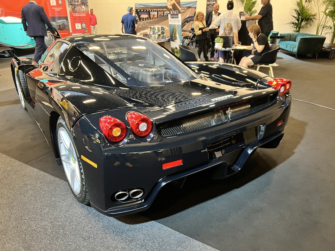 Rear view with iconic round tail lights and quad exhaust pipes