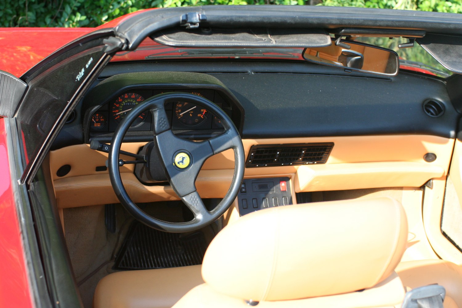 Dashboard and steering wheel with tan leather interior