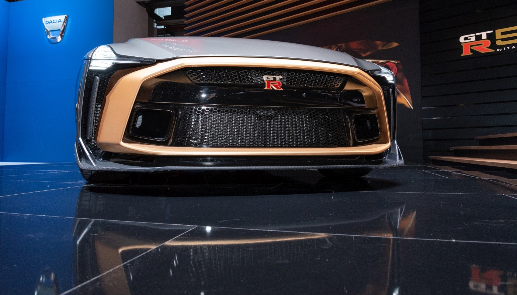 Front view with aggressive grille and LED headlights