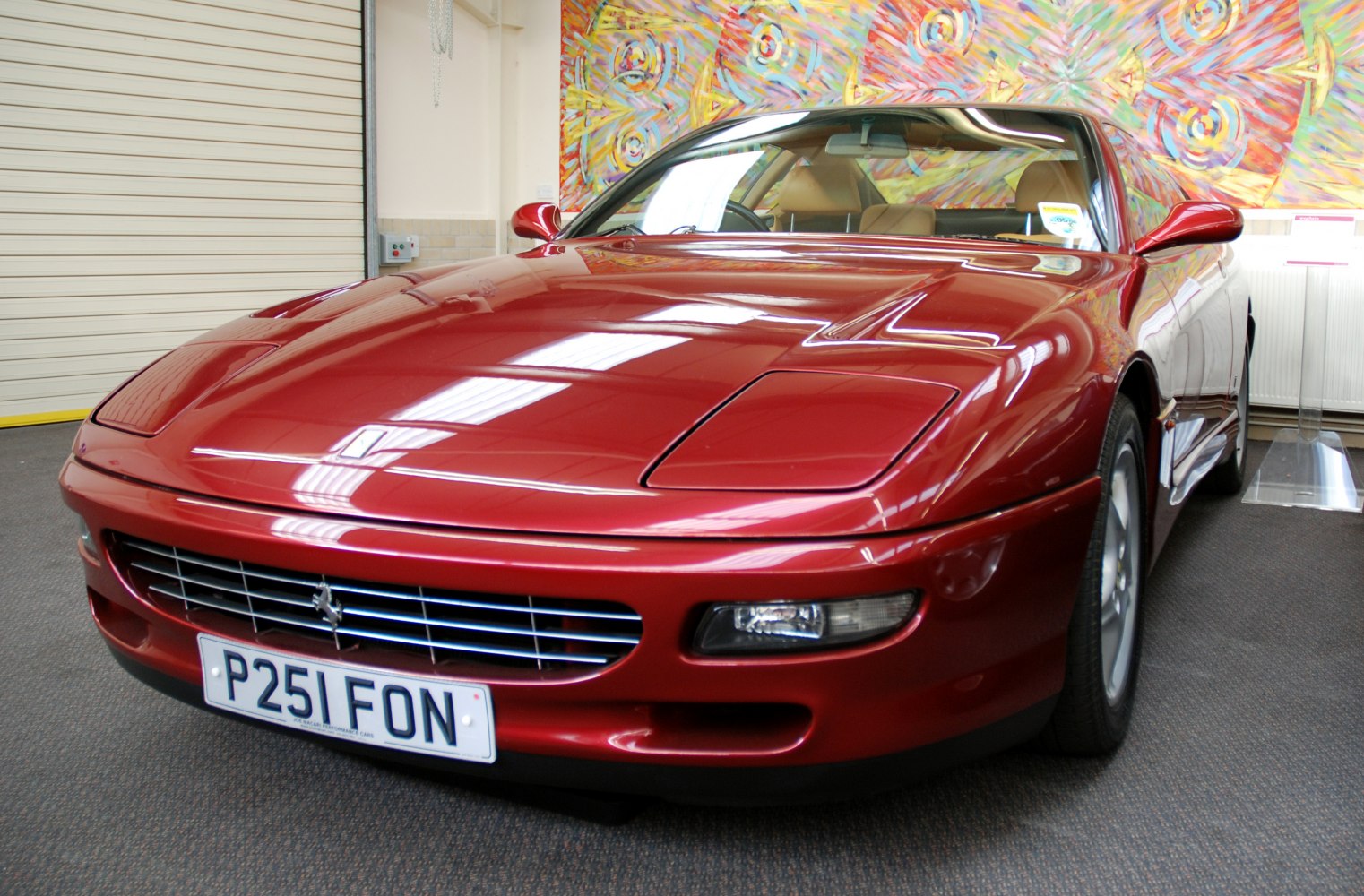 Sleek sports coupe with pop-up headlights and streamlined front end