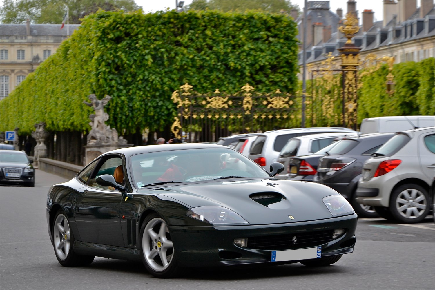 Front view of sleek sports coupe with hood air scoop