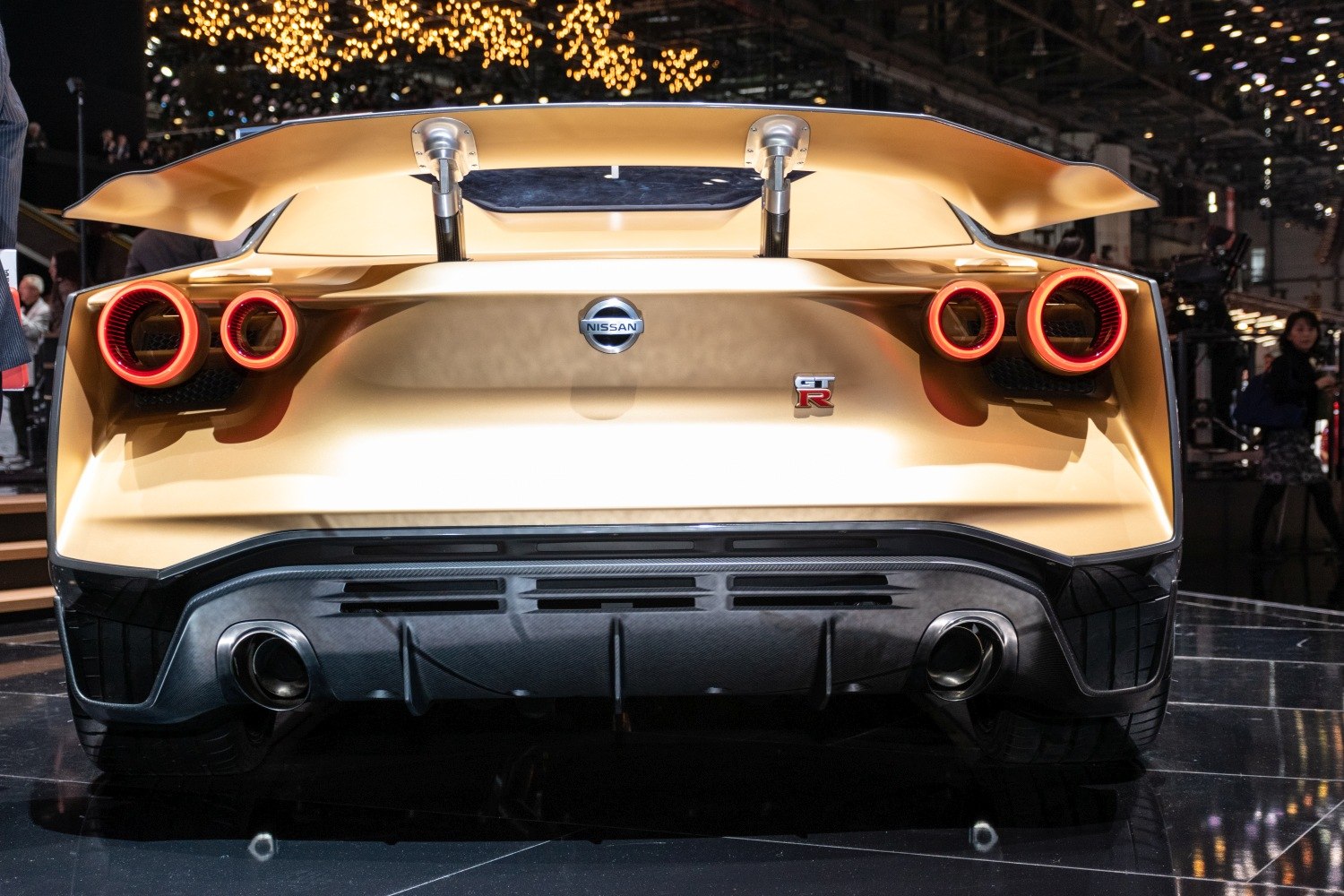 Rear end with dual round taillights and large elevated spoiler