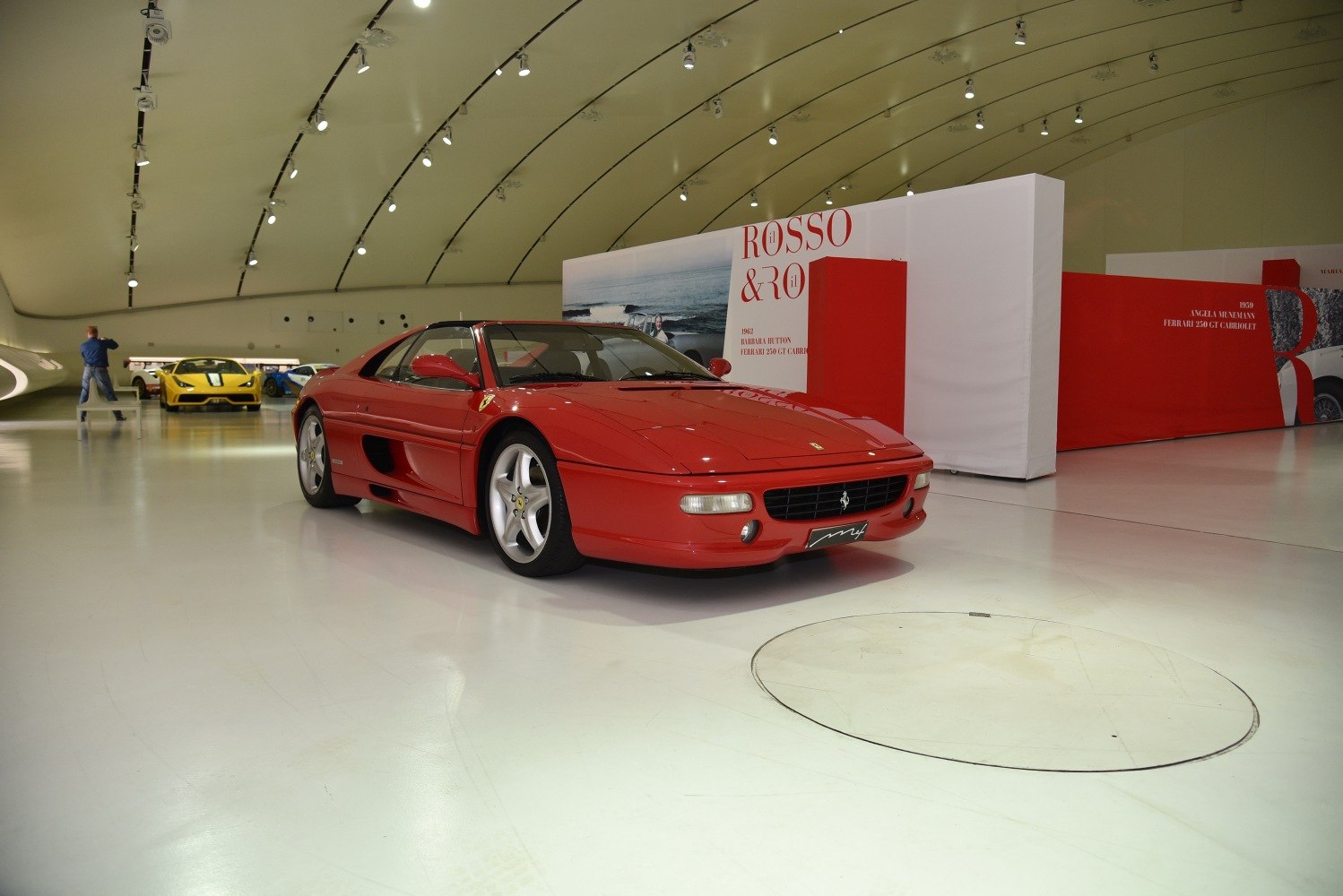 Red sports coupe with removable roof panel and side air intakes