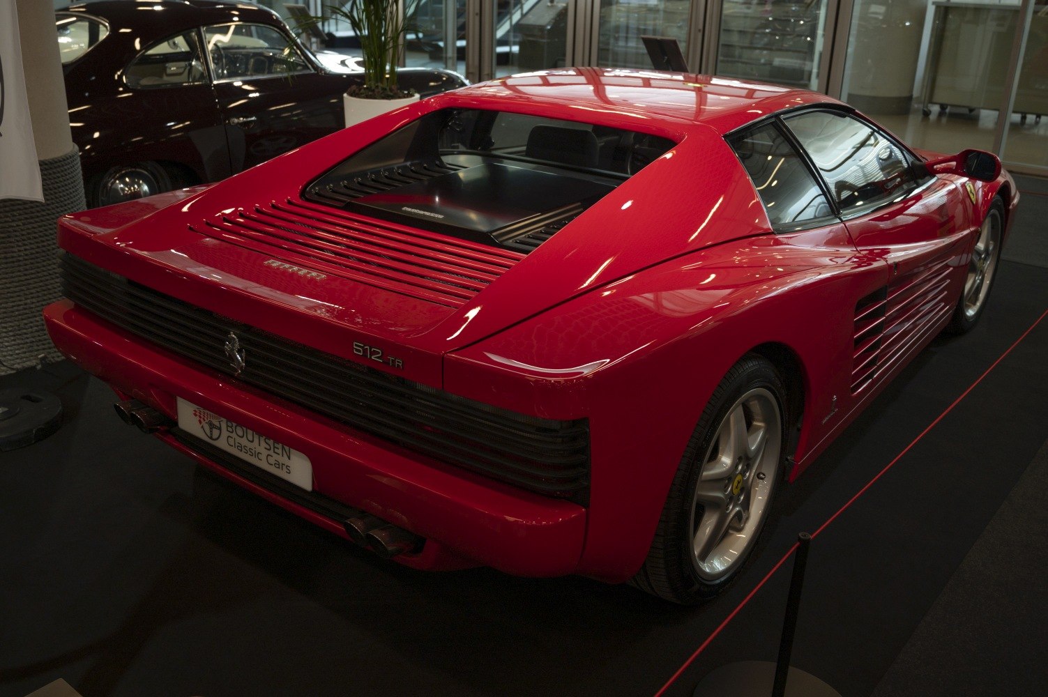 Rear and side view with distinctive side strakes and rear engine cover