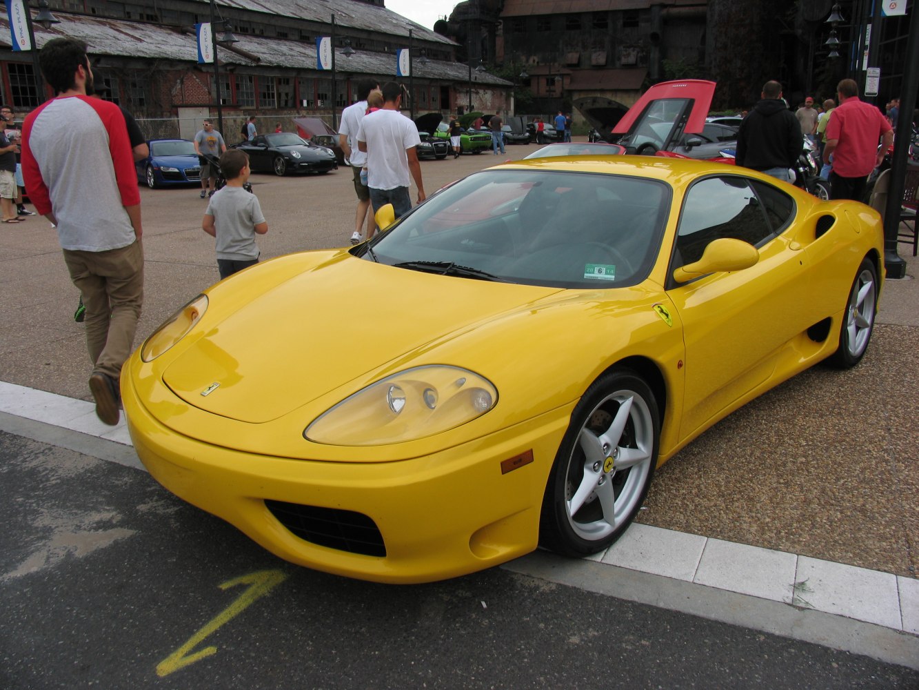 Yellow sports car with aerodynamic shape and distinctive headlights
