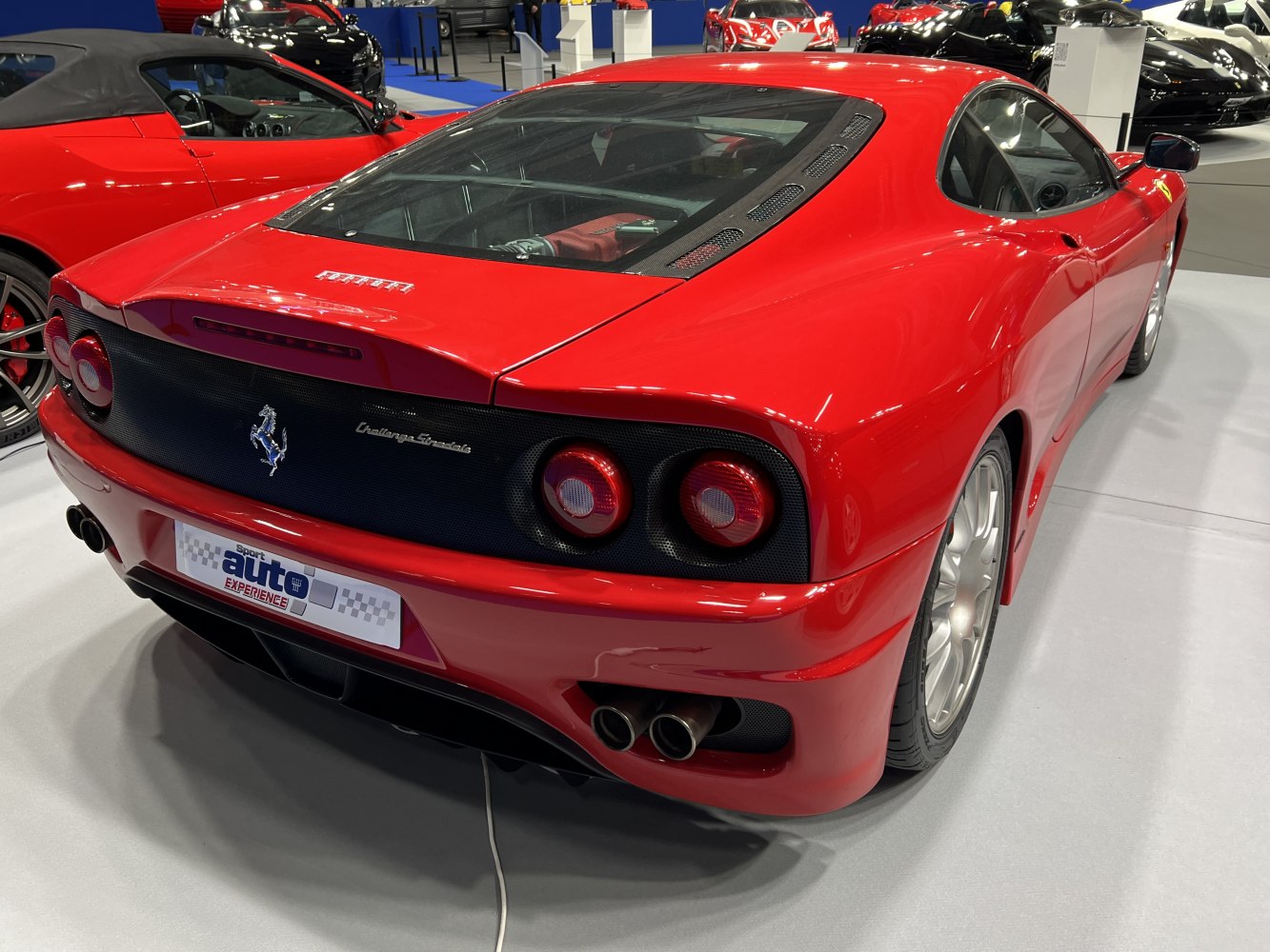 Rear view with round tail lights and transparent mid-engine cover