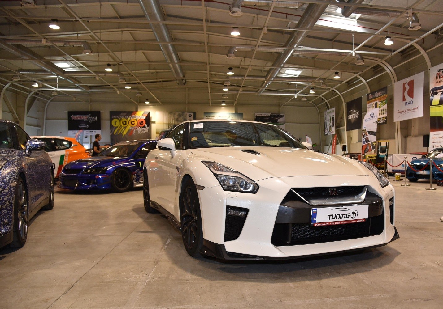 White Nissan GT-R R35 facelift front view in indoor display