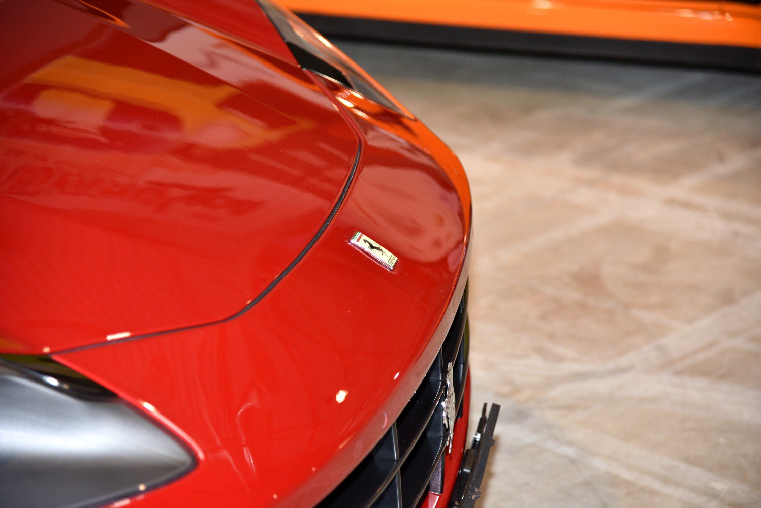 Front hood and iconic Ferrari badge close-up