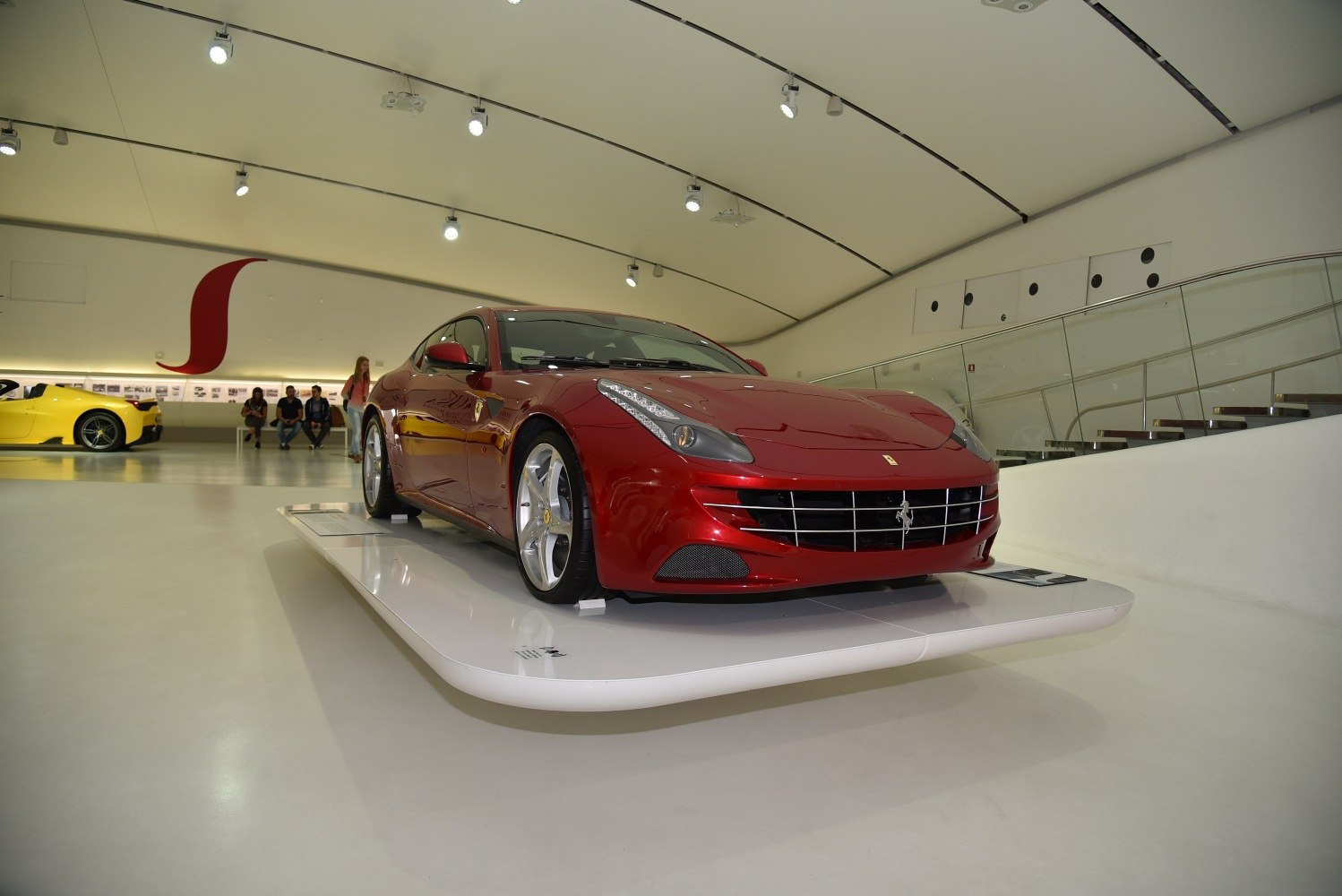 Front view of a luxury sports coupe with distinctive headlights and grille
