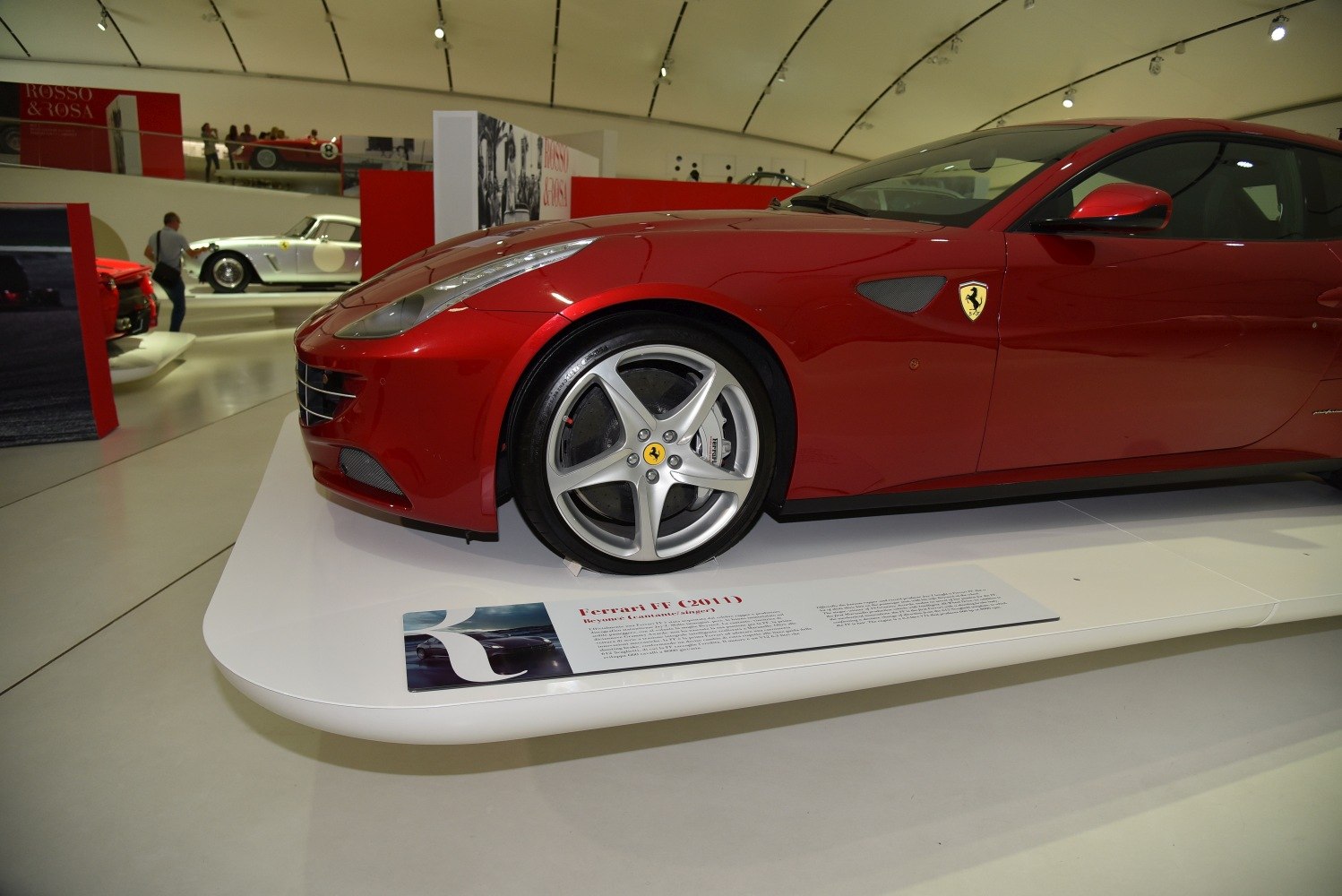 Close-up of front side with alloy wheel and Ferrari badge