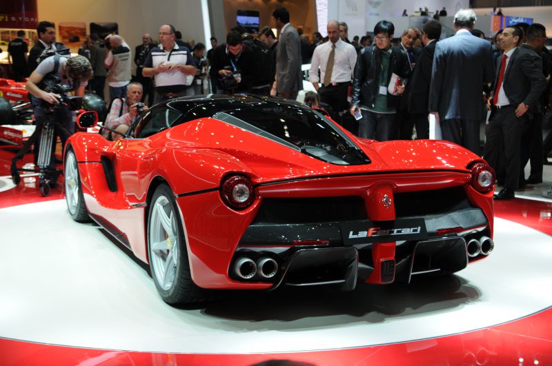 Rear view of red Ferrari LaFerrari with quad exhausts at auto show