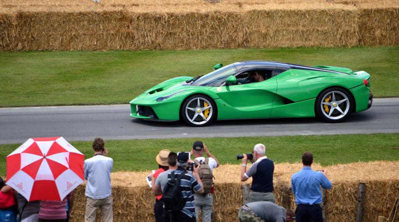 Green Ferrari LaFerrari supercar with yellow brake calipers
