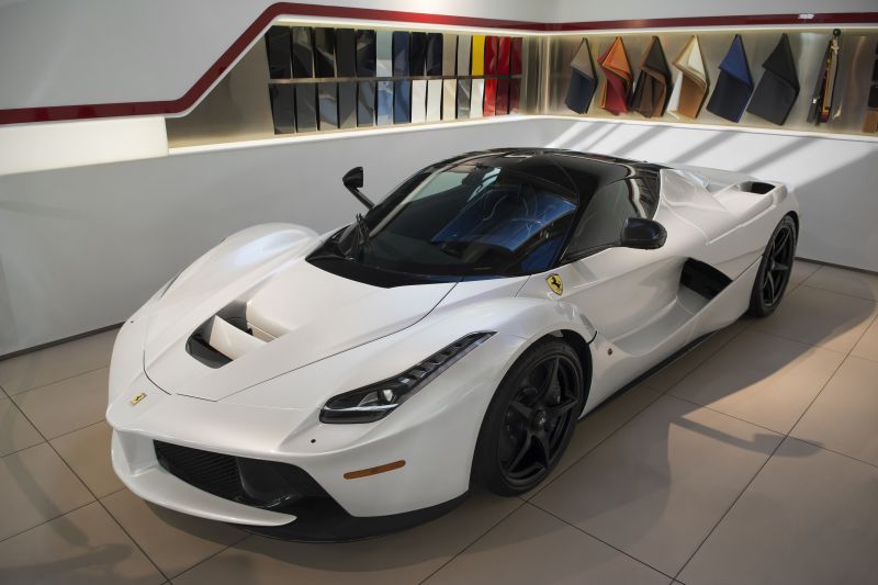 White Ferrari LaFerrari with aerodynamic front and side profile, black rims