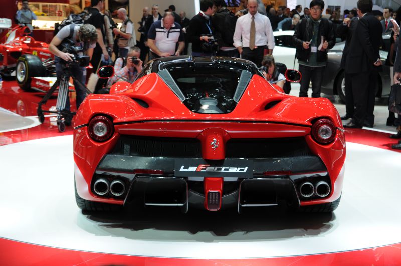 Rear view with quad exhaust and aerodynamic tail design