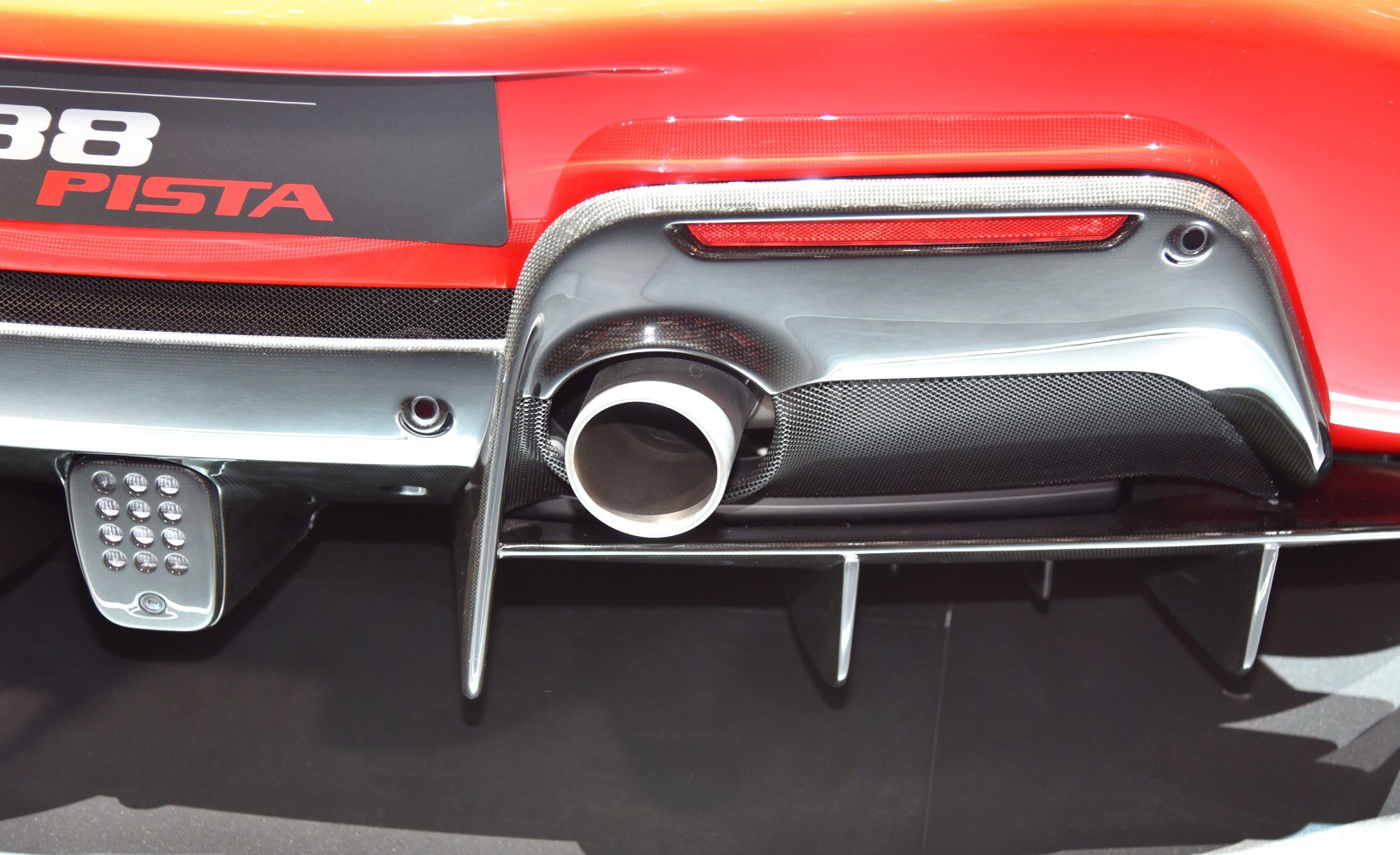 Close-up of rear exhaust and carbon fiber diffuser