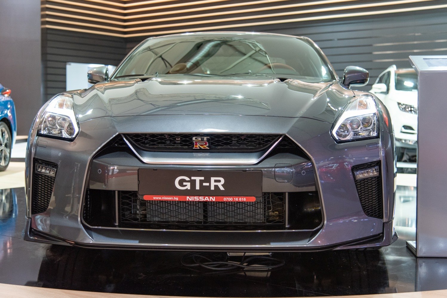 Aggressive front fascia with distinctive grille and headlights