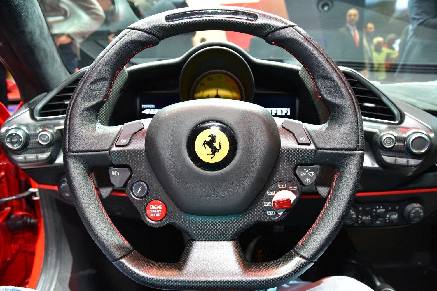 Carbon fiber multifunction steering wheel with start/stop button and controls