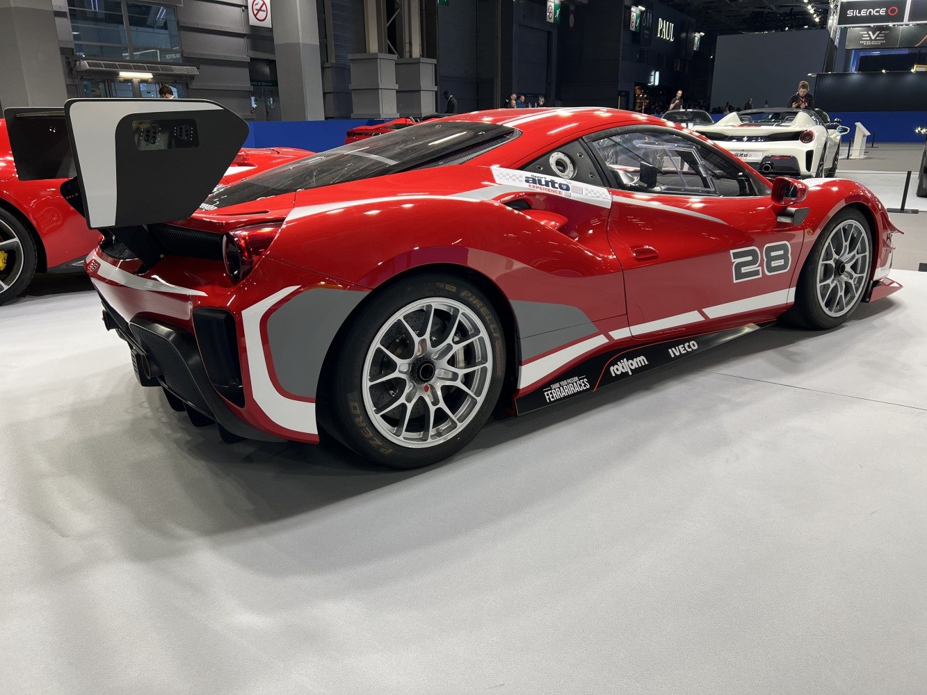 Racing rear side with large spoiler and lightweight track wheels