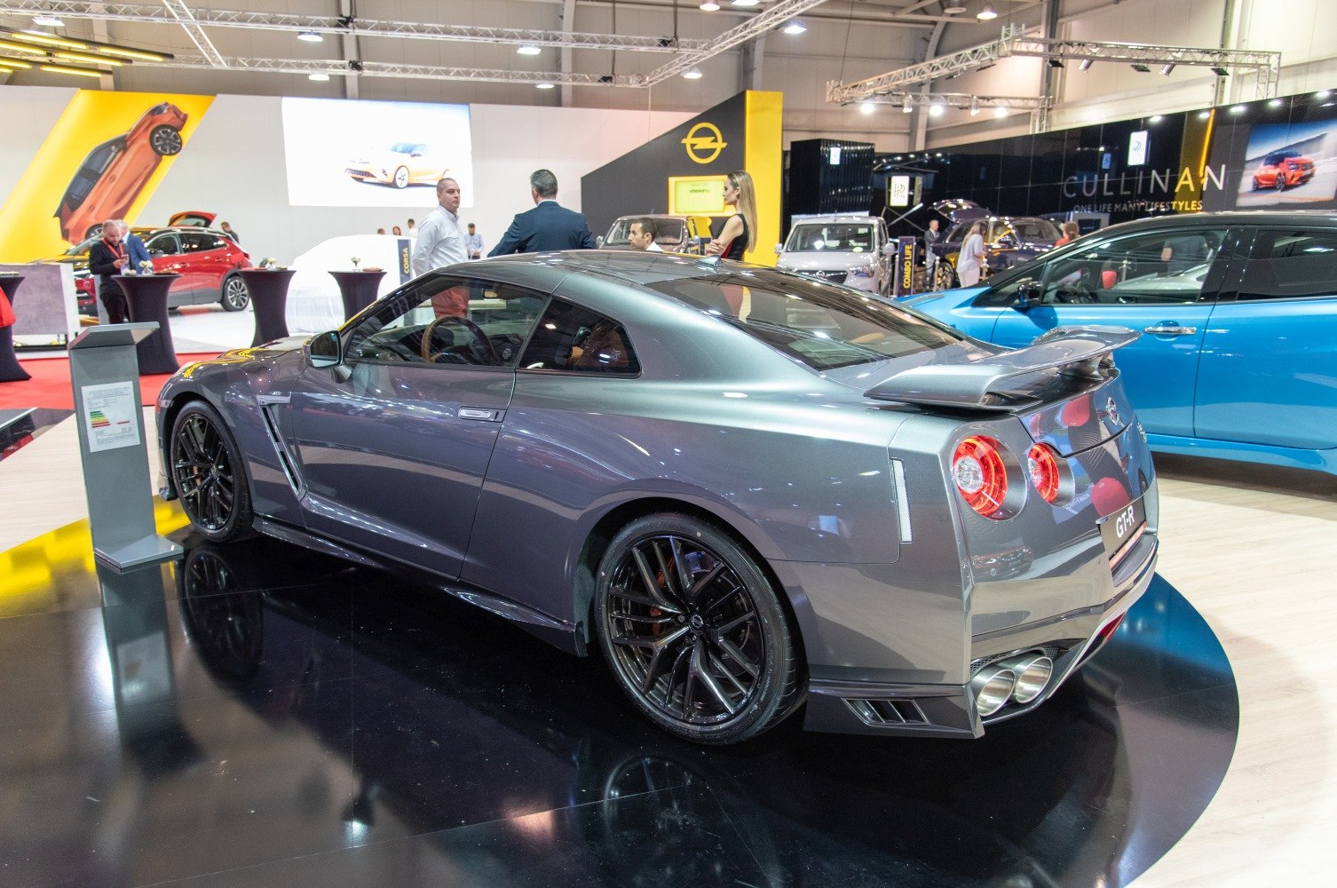 Rear side view with spoiler and quad exhausts