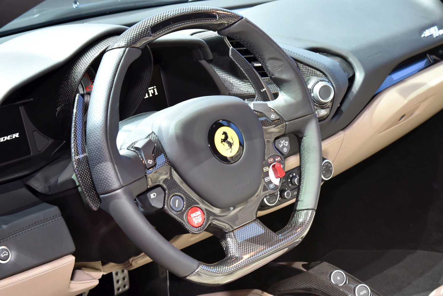 Carbon fiber steering wheel with multifunction controls and paddle shifters