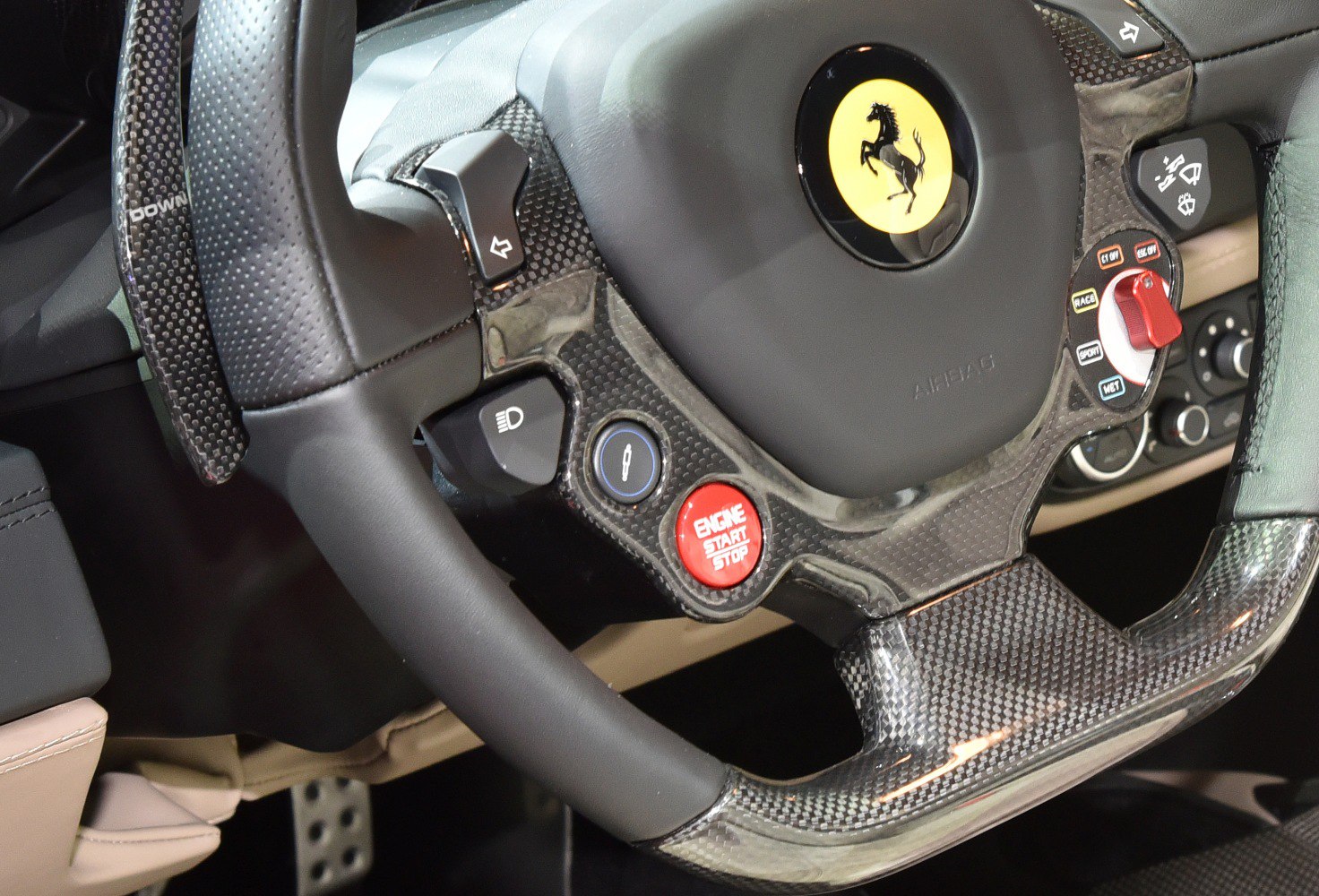 Carbon fiber steering wheel with engine start and driving mode controls