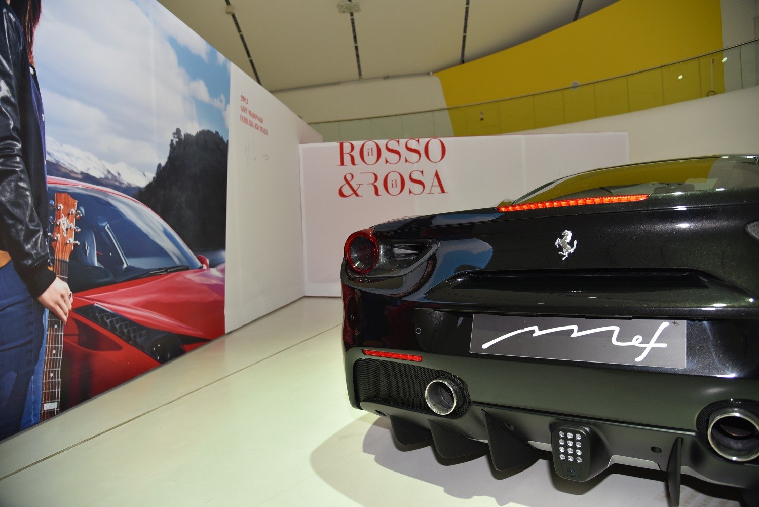 Rear end with distinctive tail lights and twin exhausts