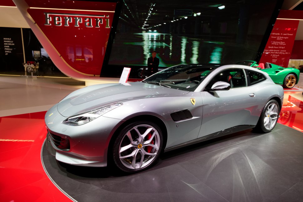 Silver sports coupe with aerodynamic front and Ferrari grille