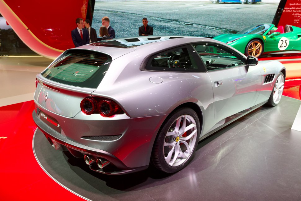 Rear side view with quad exhaust and alloy wheels