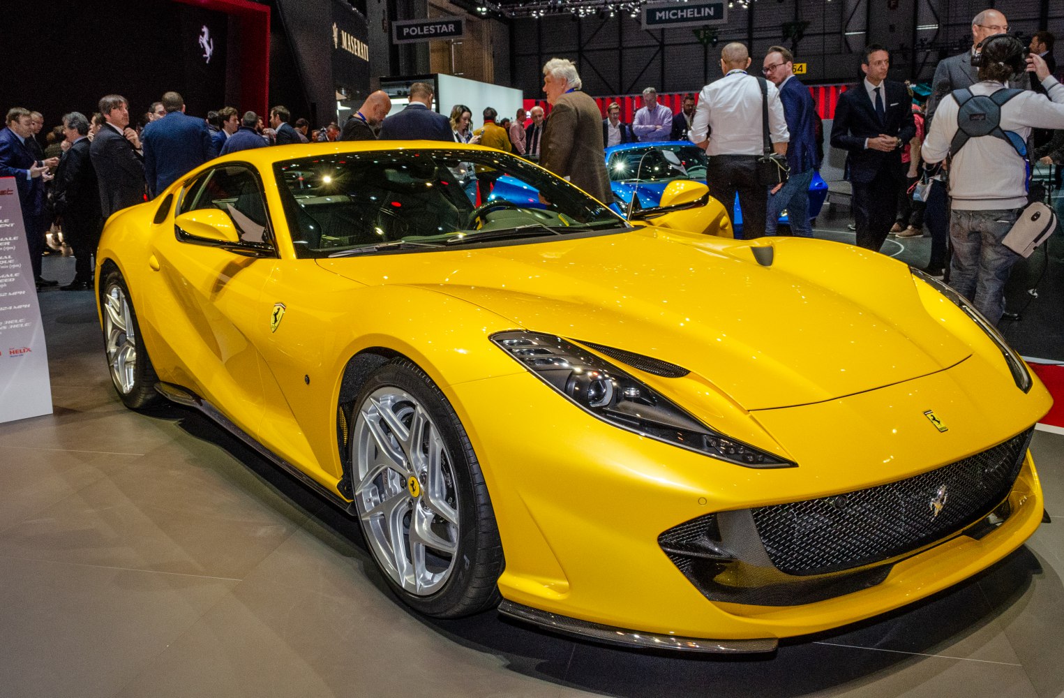 Yellow sports coupe with LED headlights and aerodynamic design