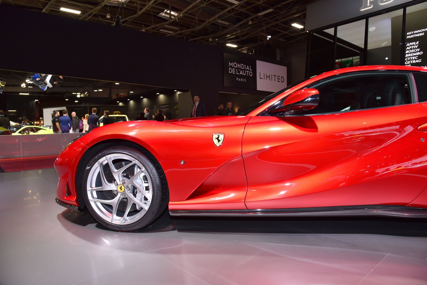 Close-up of front alloy wheel and aerodynamic side design