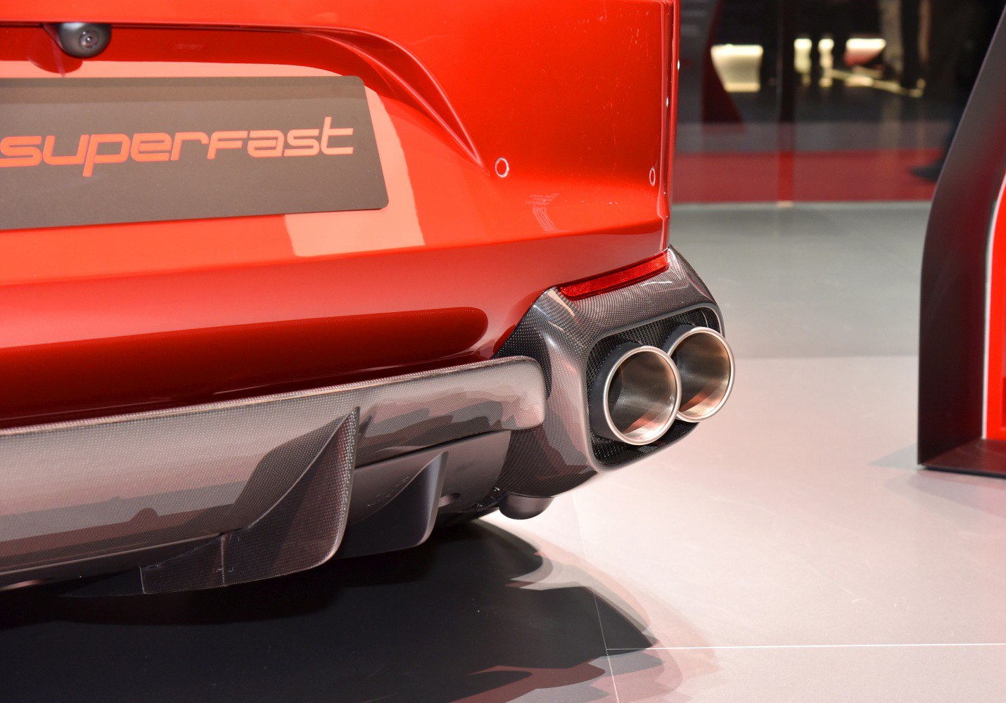 Rear twin exhaust tips with carbon fiber diffuser