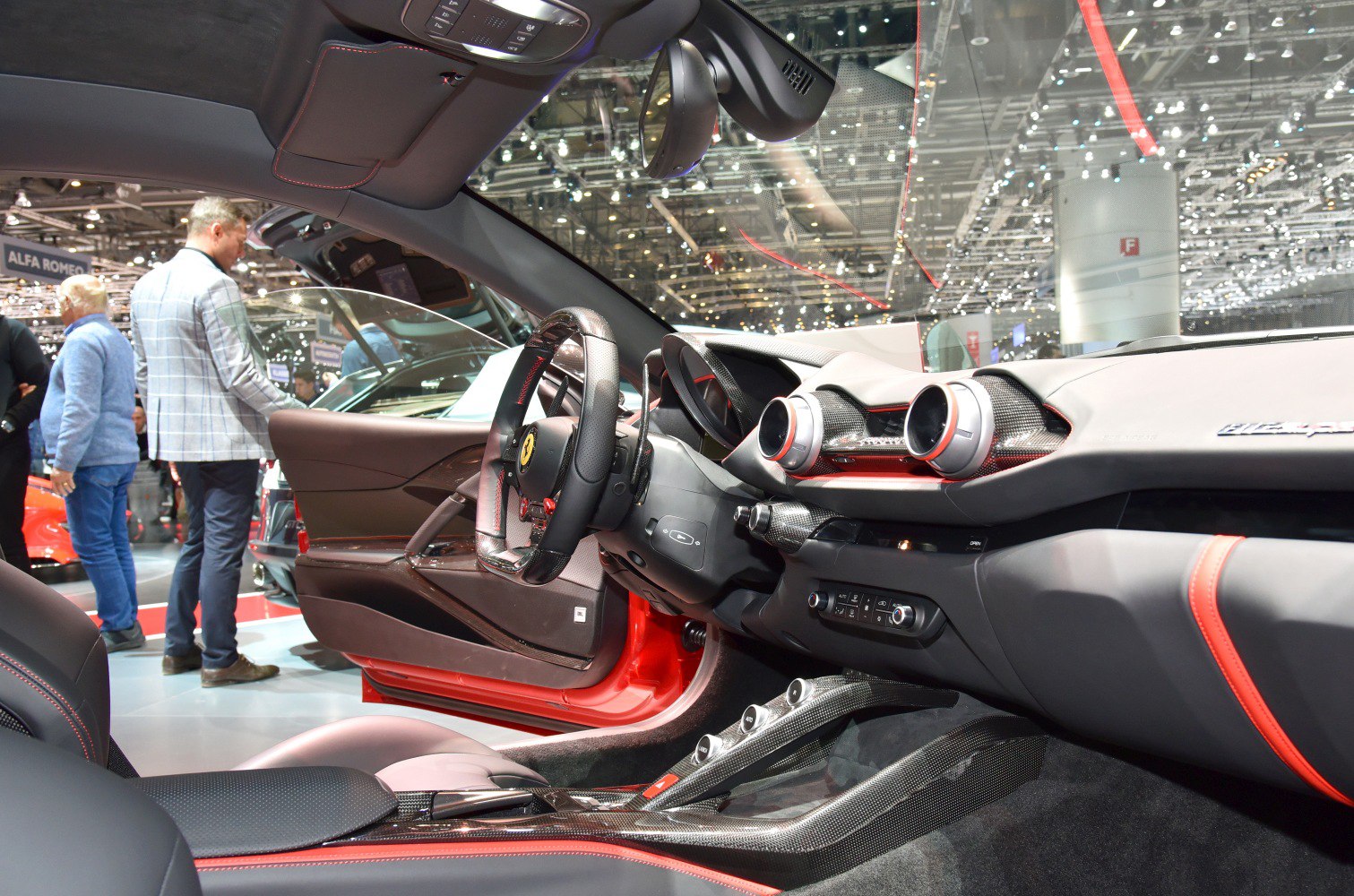 Luxury sports car interior with carbon fiber and advanced controls