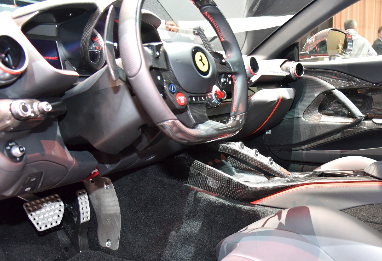Sporty steering wheel and carbon fiber dashboard interior