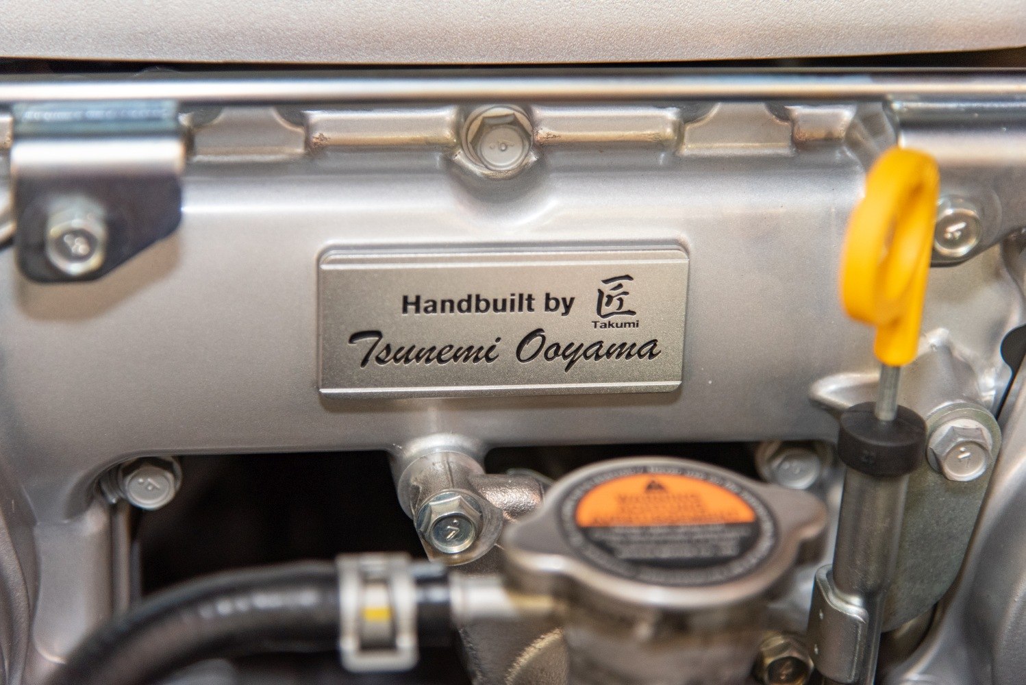 Handbuilt engine plate with craftsmanship signature