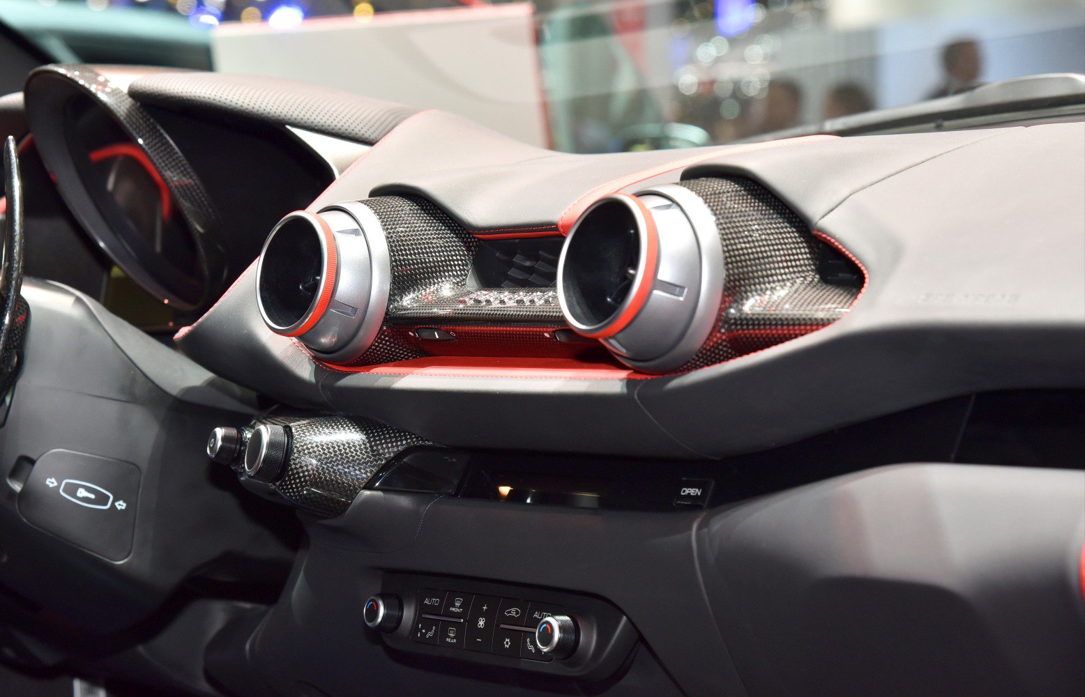 Round air vents and carbon fiber dashboard trim
