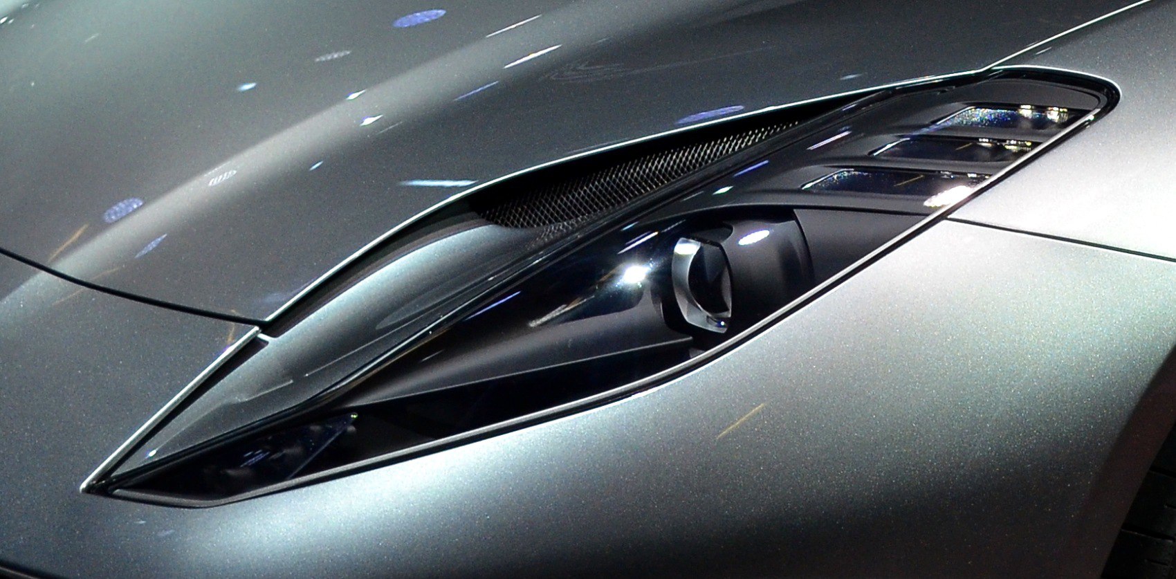 Sleek angular headlight with sharp design lines