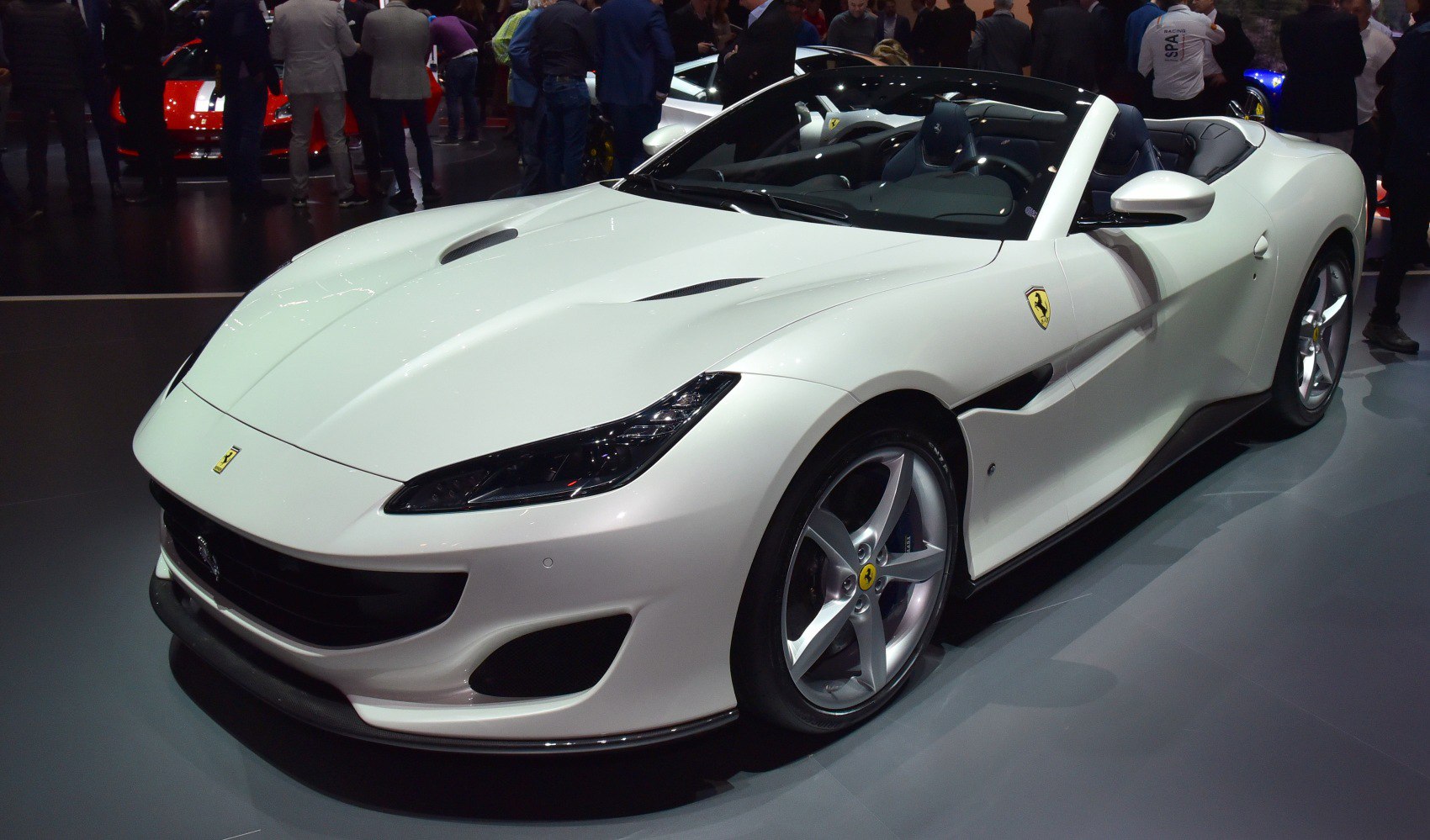 Convertible sports car with aerodynamic vents and alloy wheels