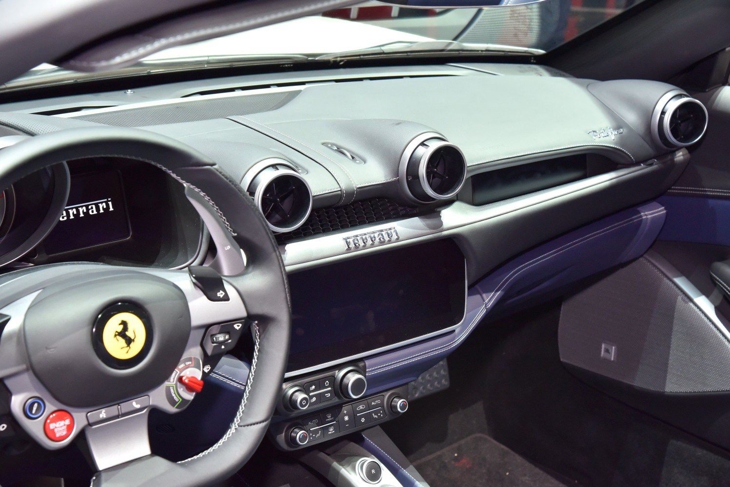 Luxury car interior with dashboard and steering wheel
