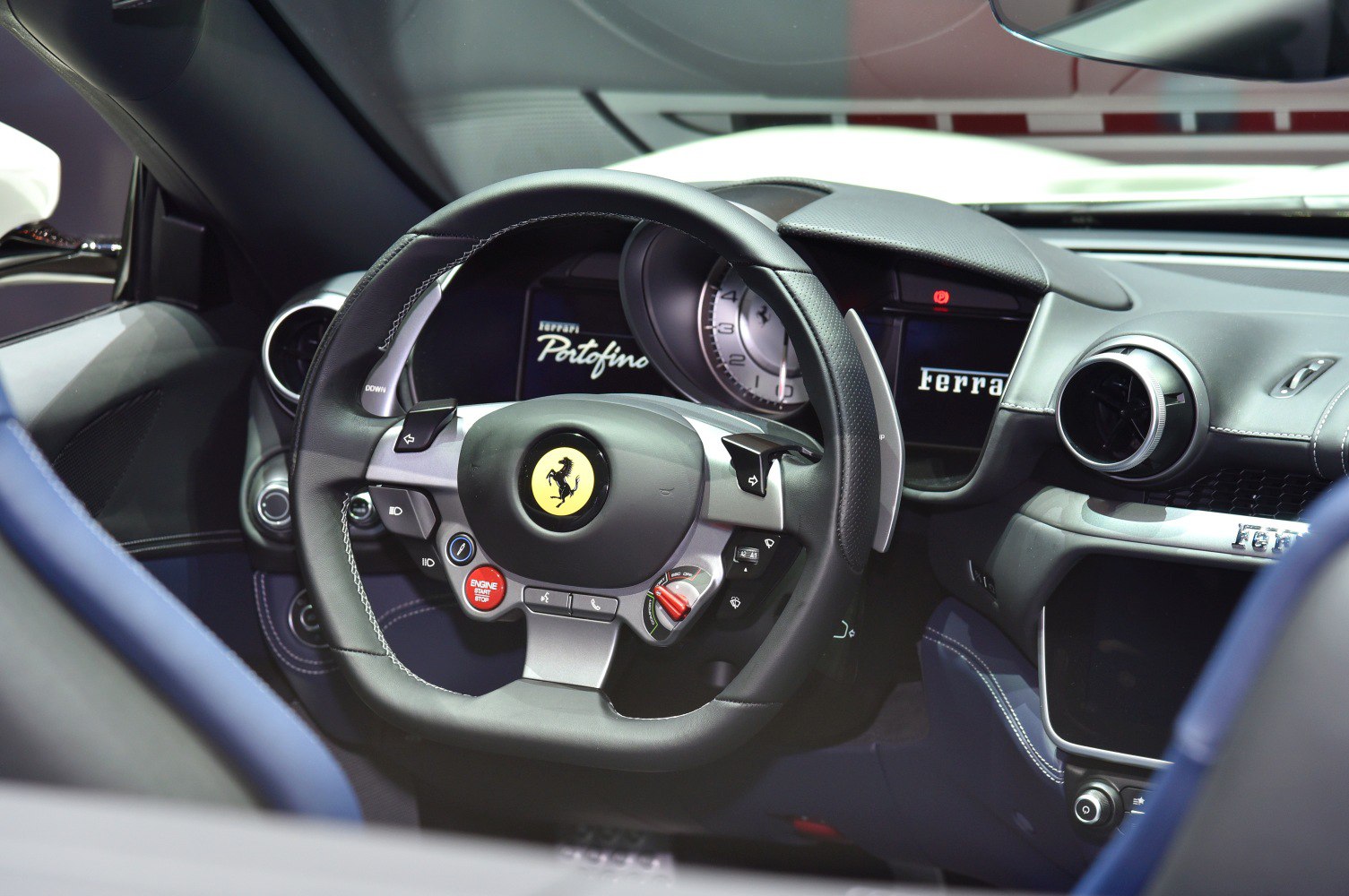 Steering wheel and digital dashboard with control buttons and displays