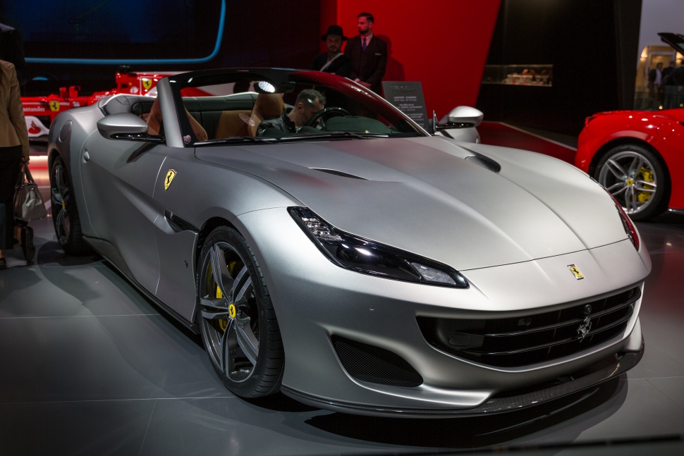 Convertible sports car front view with sharp headlights and aerodynamic design