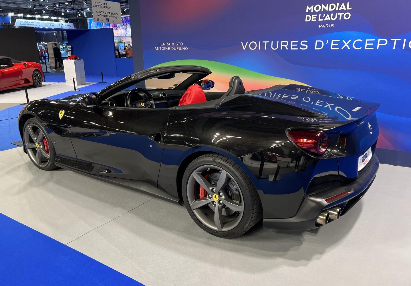 Convertible sports coupe with alloy wheels and dual exhaust