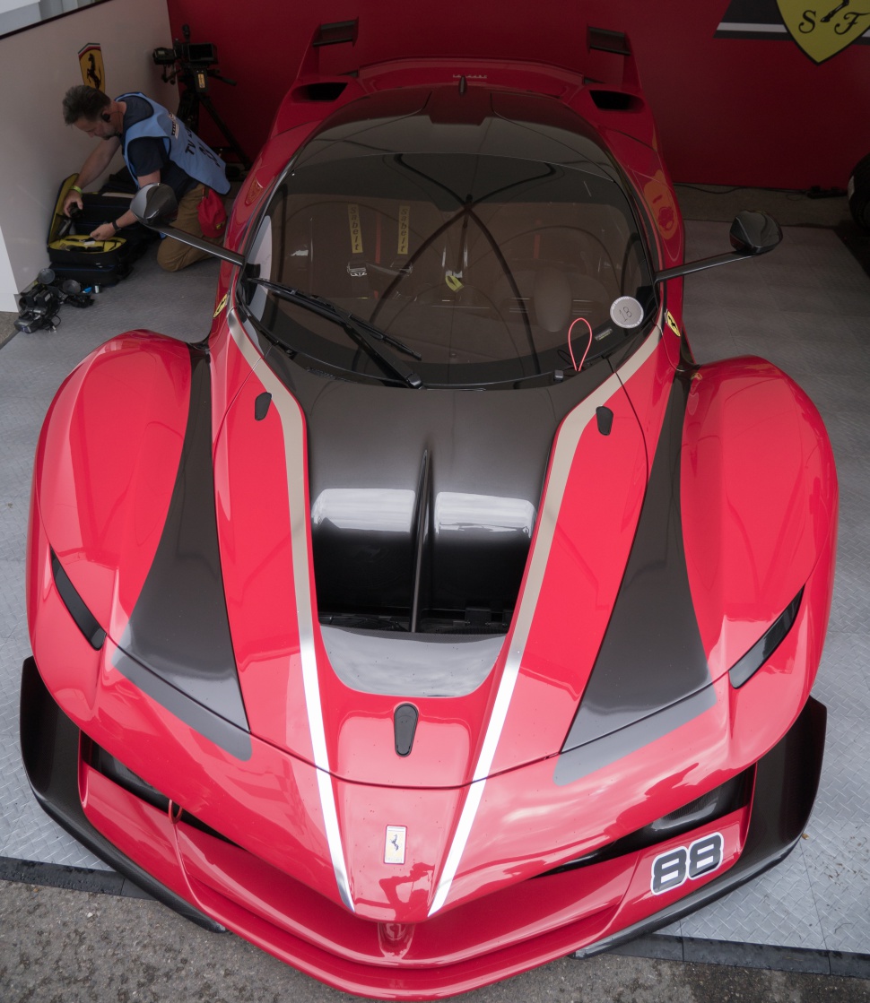 Red and black high-performance racing supercar front view with aerodynamic design